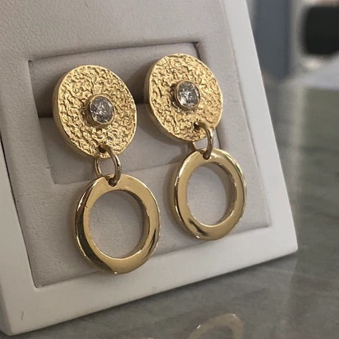 Finished remodelled earrings in Gold with Diamonds