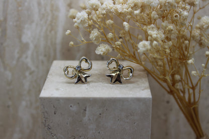 Gold diamond bow earrings
