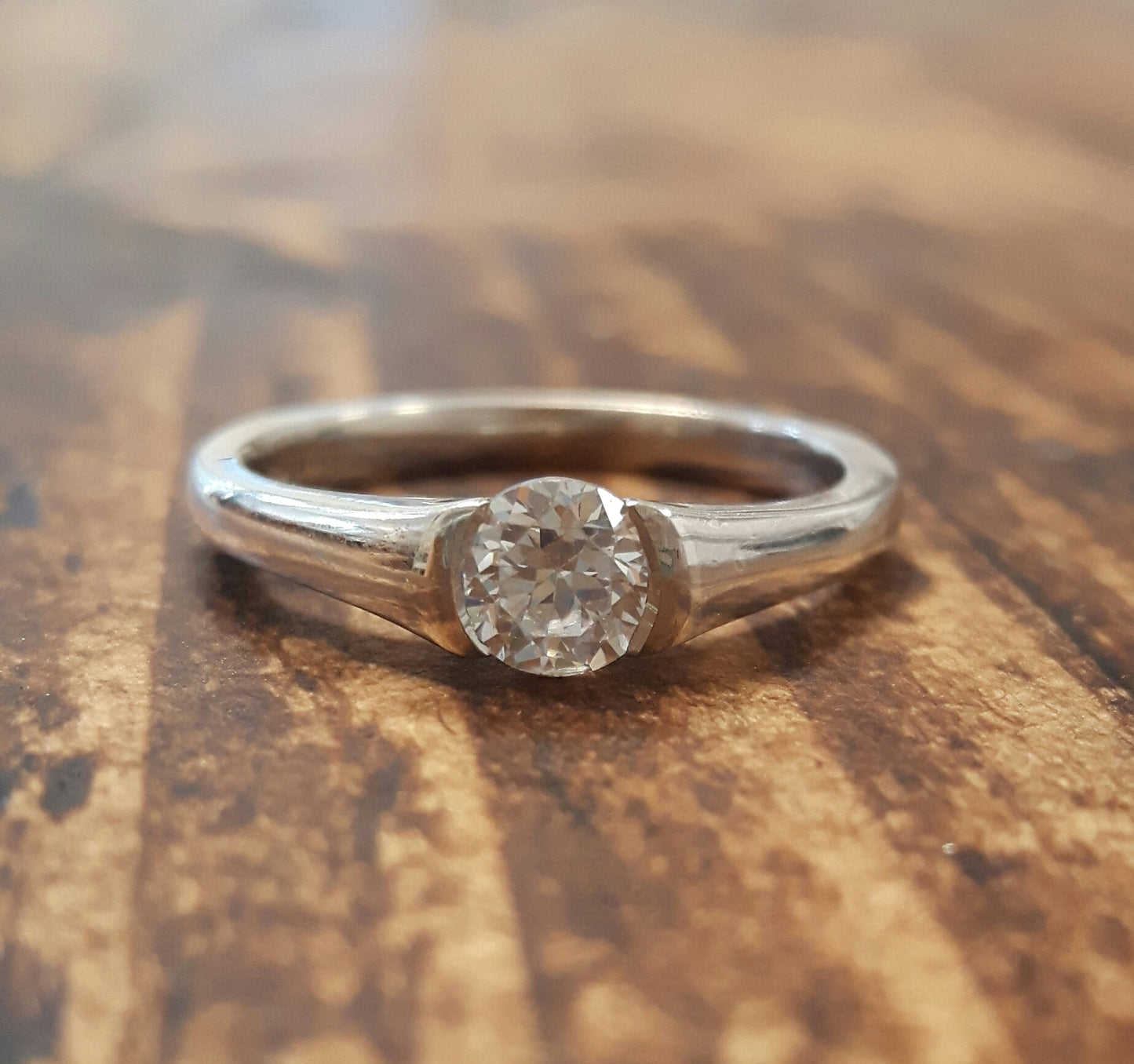 Silver and single stone CZ ring